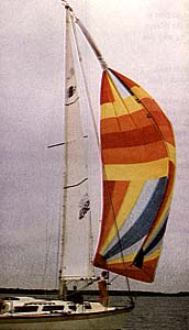 Photo of spinnaker being doused with a Chutescoop.